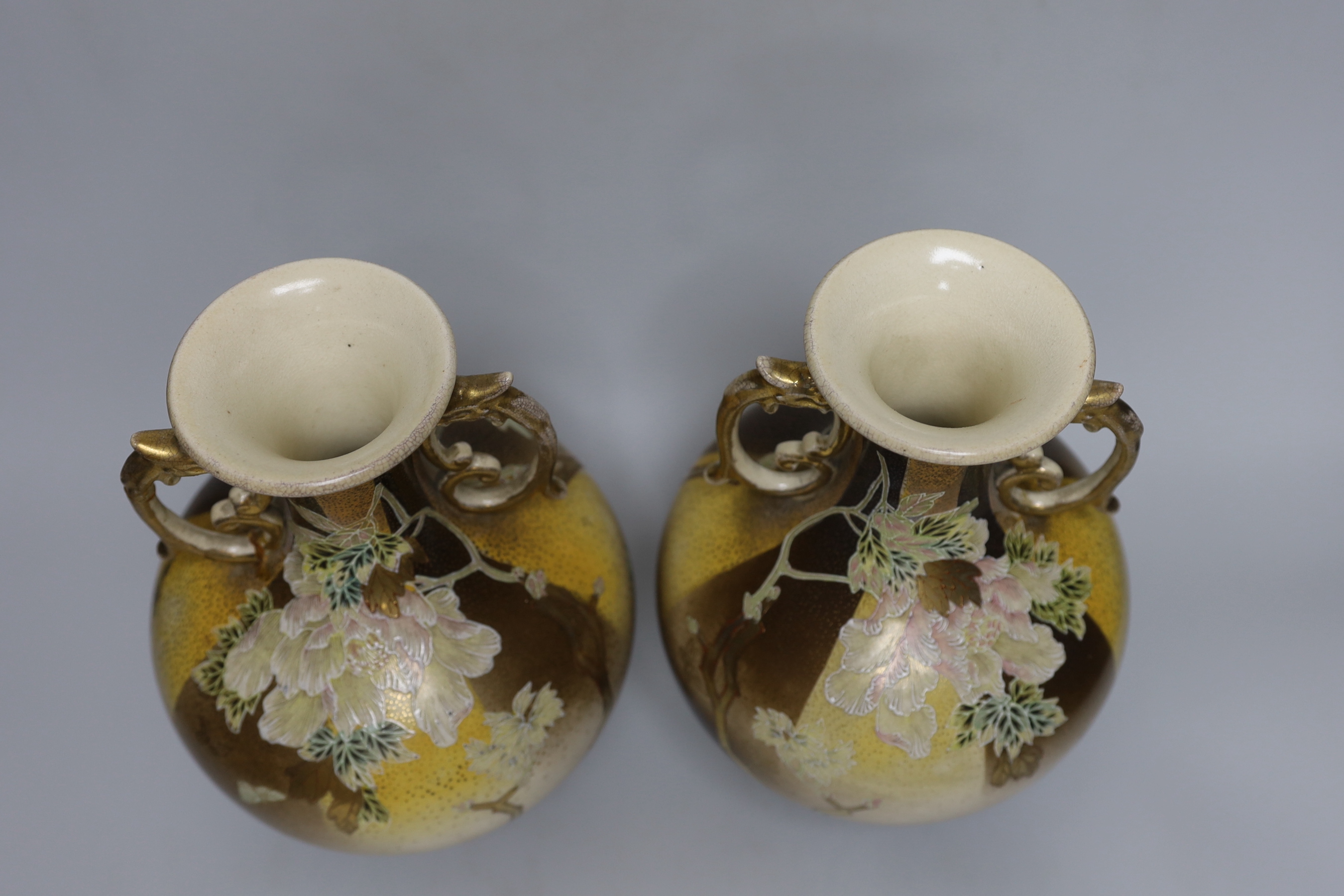 A pair of Japanese Satsuma pottery vases, 26cm